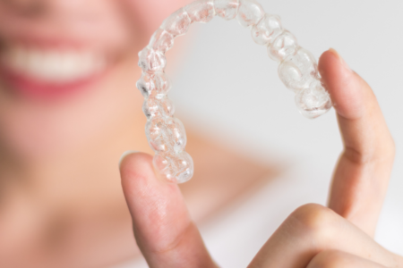 Invisalign Treatment and The Benefits of Straight Teeth